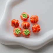 Perle tomate 16 mm en céramique - Orange - Vert x1
