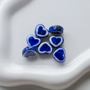 Perle coeur 12x14 mm en céramique - Bleu x1