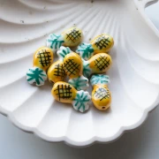 Perle ananas 22x11 mm en céramique - Jaune - Vert x1