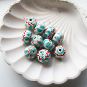 Perle rondelle 15x10.5 mm en céramique - Turquoise - Rouge x1