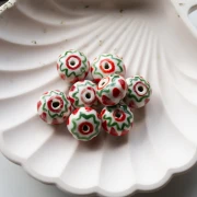 Perle rondelle 15x10.5 mm en céramique - Rouge - Vert x1