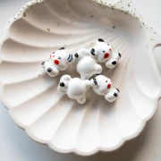 Perle ourson 19.5x16 mm en céramique - Blanc - Noir x1