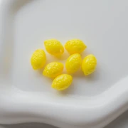Perle citron 13x9 mm en acrylique opaque - Jaune x10