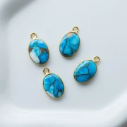 Breloque ovale 18x11 mm en pierre gemme - Turquoise Oyster Bleu x1