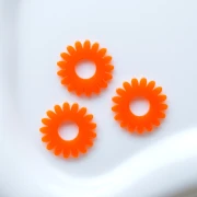 Pendentif fleur marguerite 20 mm acrylique translucide - Orange x1