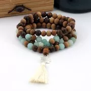 Perles gourous 12 et 9 mm pour fabriquer un Mala Tibétain imitation Howlite x1