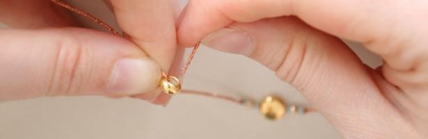 enfiler une perle stoppeur