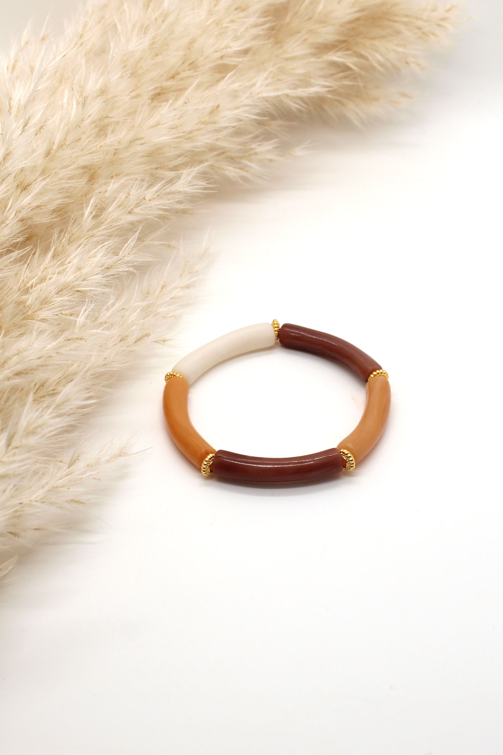 Schéma Bracelet élastique perles tubes incurvés en pâte Fimo et Cernit Schéma Bracelet élastique perles tubes incurvés en pâte Fimo et Cernit