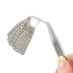 Comment utiliser une coquille pour faire un pompon avec des chaines ? : Etape 7