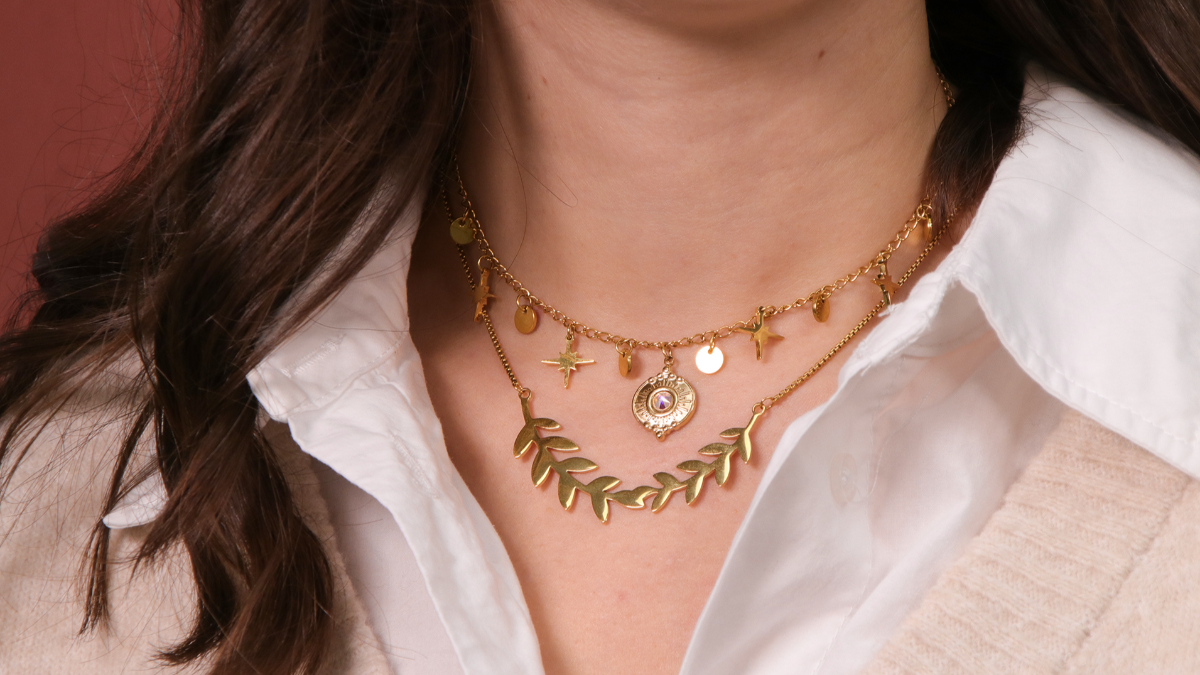 Deux Colliers en acier inox doré pendentif branche