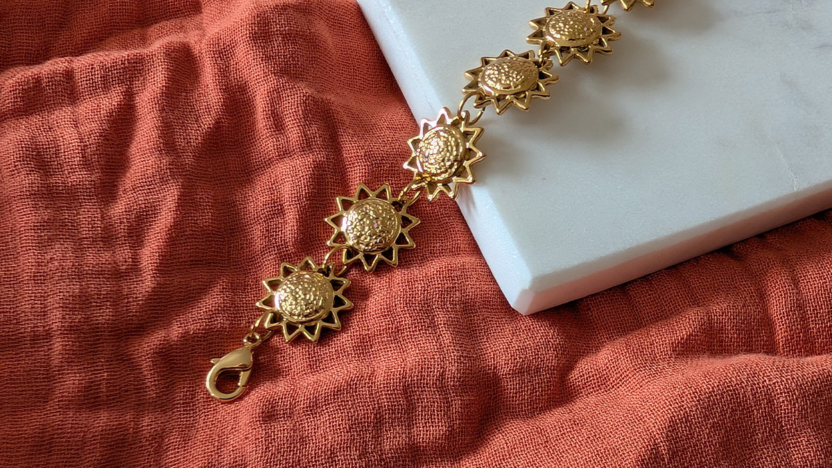 Schéma Bracelet soleil en acier inox doré Schéma Bracelet soleil en acier inox doré