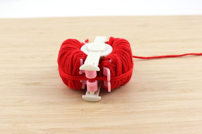 Bijou de sac pompon cœur en laine : Etape 5